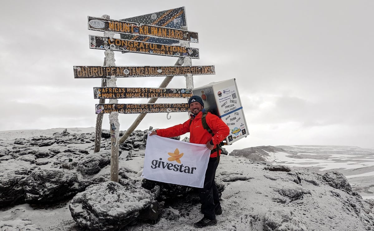 Michael Copeland, climbs to the summit of Kilimanjaro carrying a 30kg ...